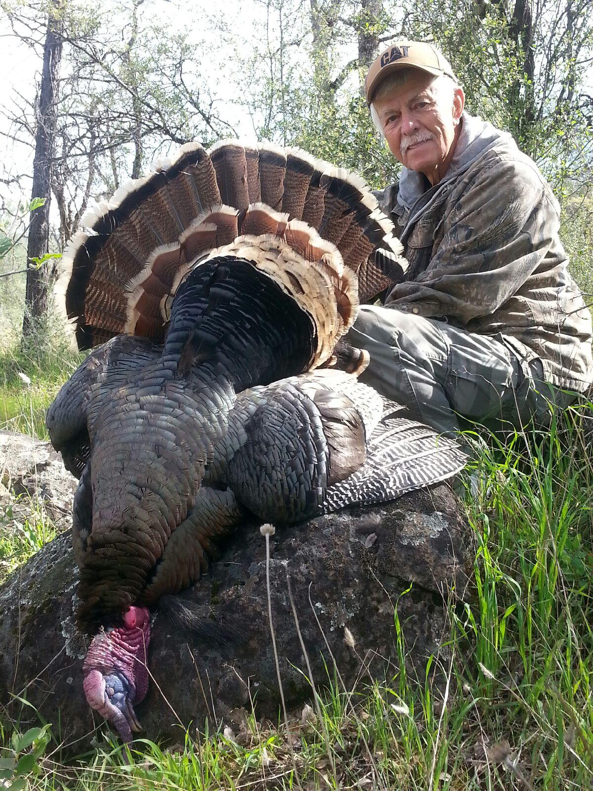 Rob  with another one of many turkeys in his hunting career